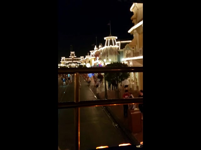 Omnibus vs Balloon Boy main street racing in Magic Kingdom Disney World