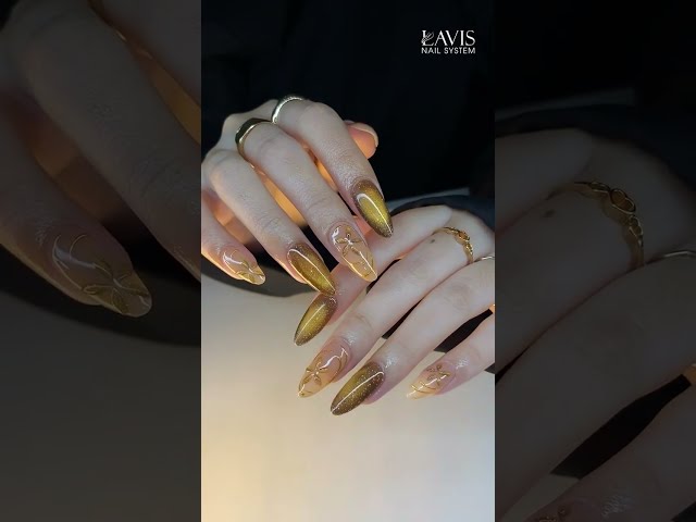 Autumn leaves & amber dreams 🍁 Golden cat eye perfection powered by LAVIS🍂💅🏻