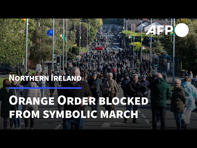 People block Protestant Orange Order march due to pass through mainly Catholic area | AFP