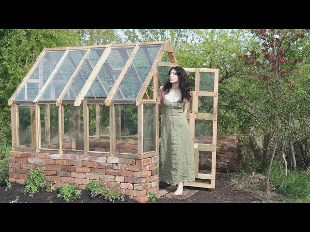 I built this greenhouse by myself using only scrap materials