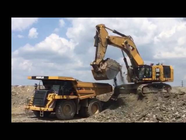 Caterpillar 6015b loading 777's