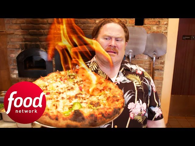 Casey Chows Down On Scorching Hot Ghost Pepper Pizza | Man v Food