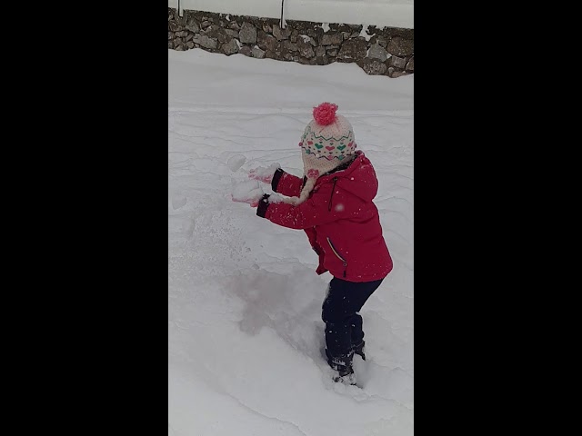 Slow motion -Idila playing with Snow
