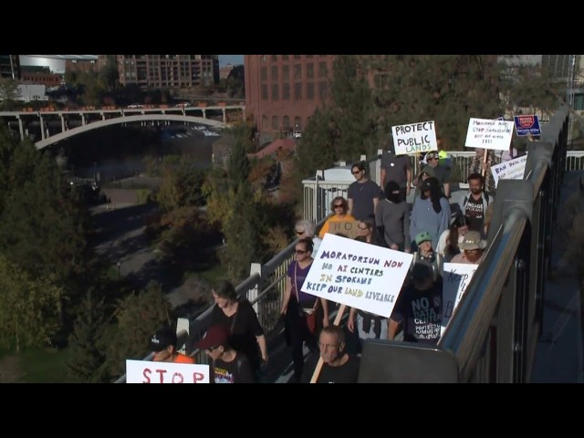People gathered at Riverfront Park to use their voices against data centers
