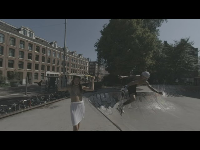 Skateboarder jumps over girl.