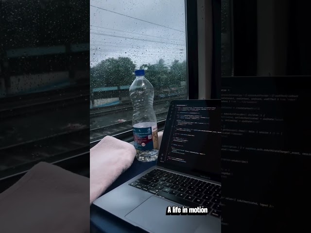 Rain outside. Code inside. ☔💻Somewhere between deadlines and destinations. 🚆
