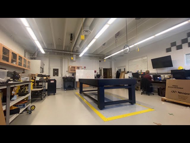 Installing a large optical table at CVISS Lab