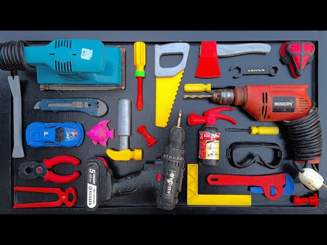 Collection of Repair Tools, Electric Drill, Electric Saw, Hammer With Wriench, Pliers, Hacksaw