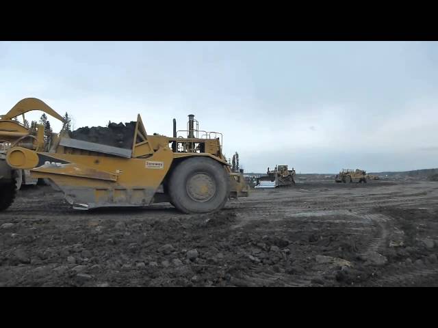 Caterpillar D10N vs 6 Caterpillar 657's