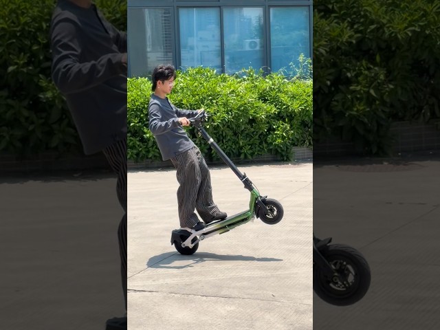 Ready for a wheelie? 😏🔥Would you try it? 👀#Wheelie #WheelieChallenge #EScooter #Scooter #stuntrider