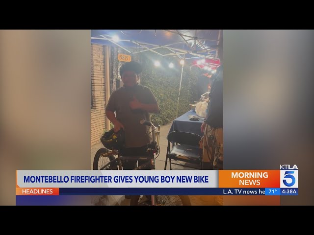 Firefighter gifts bicycle to young boy working at family taco stand in Montebello