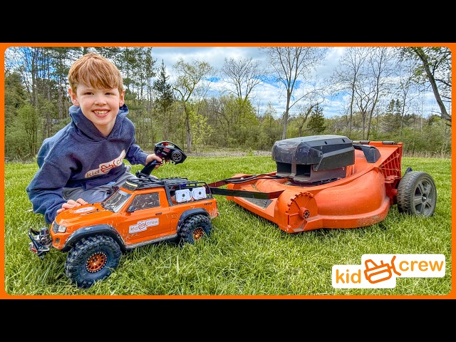 Remote controlled truck mowing lawn and landscaping. Build and use with dad. Educational | Kid Crew