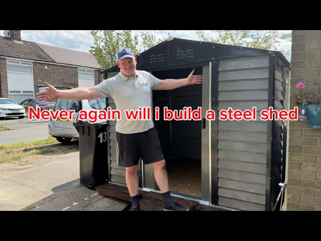 Building a raised wooden base and erecting a steel shed in 30 degree centigrade heat. NEVER AGAIN