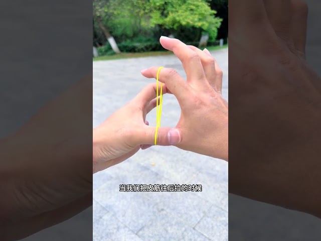Rubber Band Through Hand Magic Trick Tutorial