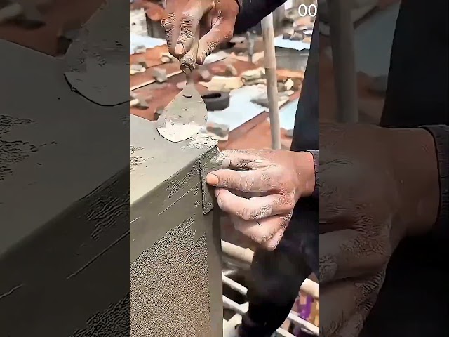 trowel smooths cement corners for a clean concrete finish #concrete #construction
