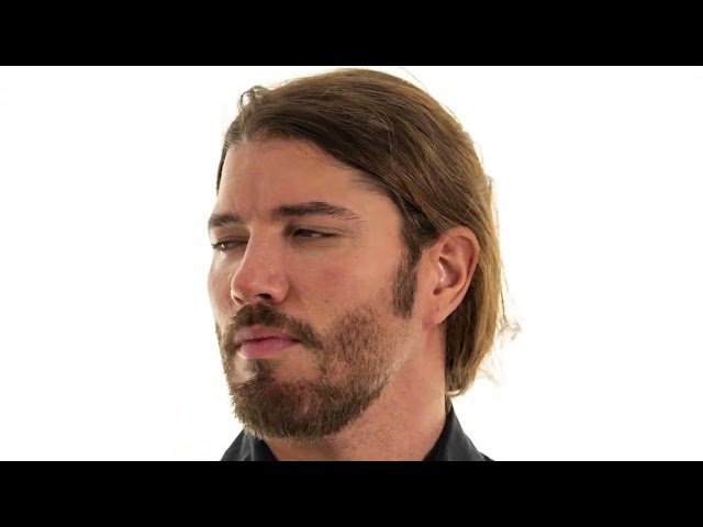 A man looking left and right for verification dl