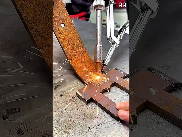 welding torch fuses a rusted strip to a metal block #welding #metalwork