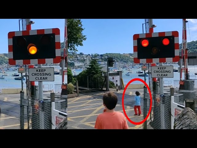 Child Runs onto Level Crossing as Lights Flash