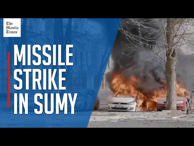 Emergency workers operate at site of missile strike in Sumy