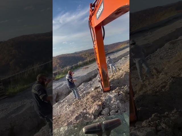 Tricking a labor hand into thinking he’s so strong. Only to cut the bag of sand.