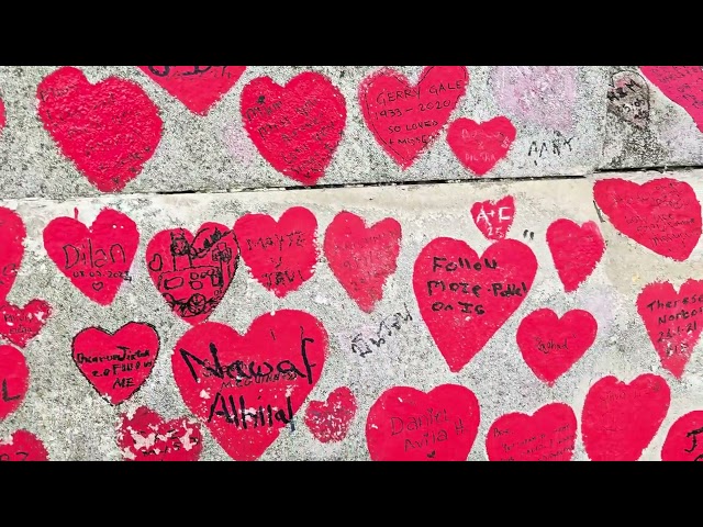 Parliament, Big Ben and covid memorial wall, London