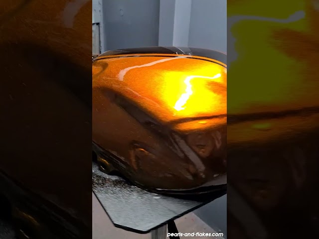 Pintura moto negro con naranja CANDY