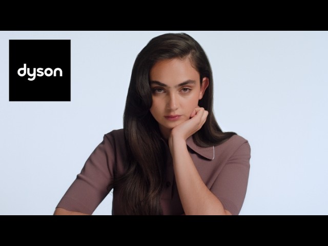 Create a blowout finish with body: Dyson Airsmooth™ styling brush