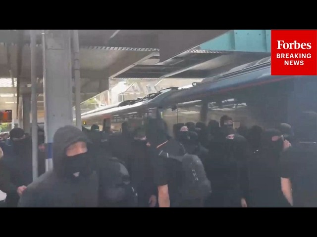 JUST IN: 'Stop The Boats' Protestors Seen Marching Through Dover, England, Amid Migrant Boat Arrival