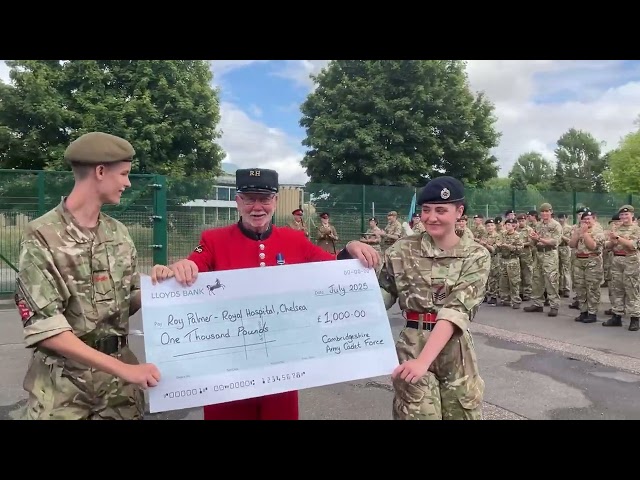 Chelsea Pensioner Roy Palmer receives a cheque from Cambs Army Cadets