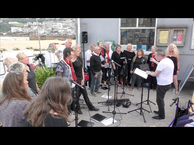 THE PHOENIX SINGERS ON THE PLAT BY THE LODGES