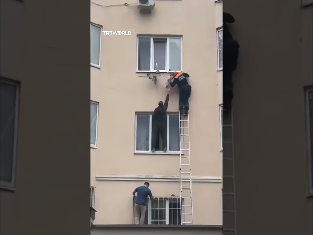 Child found stranded on third-floor window ledge