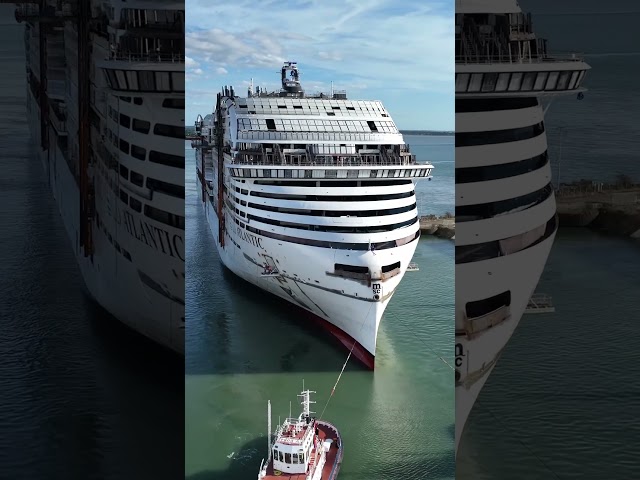 From the dock to the water. MSC World Atlantic is on her way.