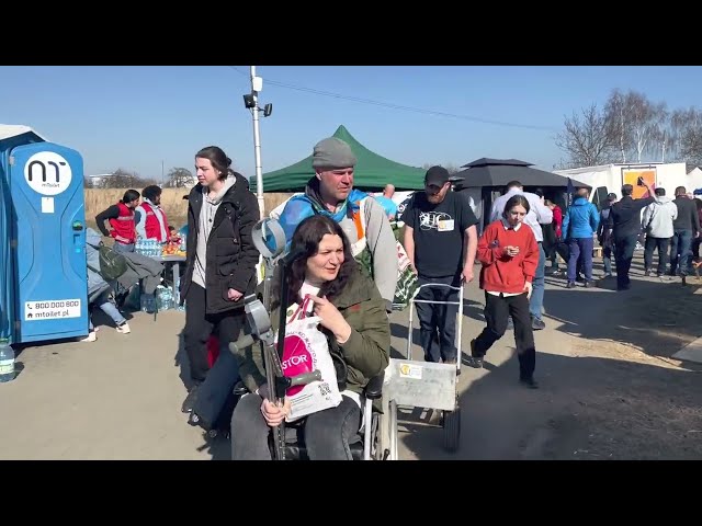 Ukrainian Refugees Walking into Poland at the Border