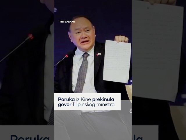 A message from China interrupts the Philippine minister's speech