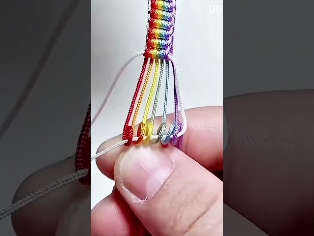 rainbow threads form a beautiful macrame bracelet #macrame #bracelet