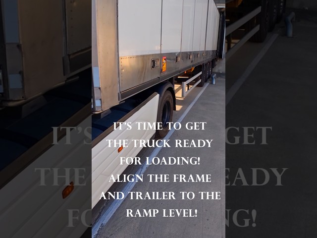 A truck with a trailer is parked under a ramp for loading and needs to be level. Nikotimer 4K POV
