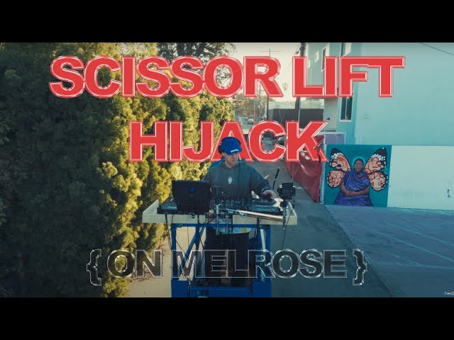 We rigged up a SCISSOR LIFT with CDJs and sent it