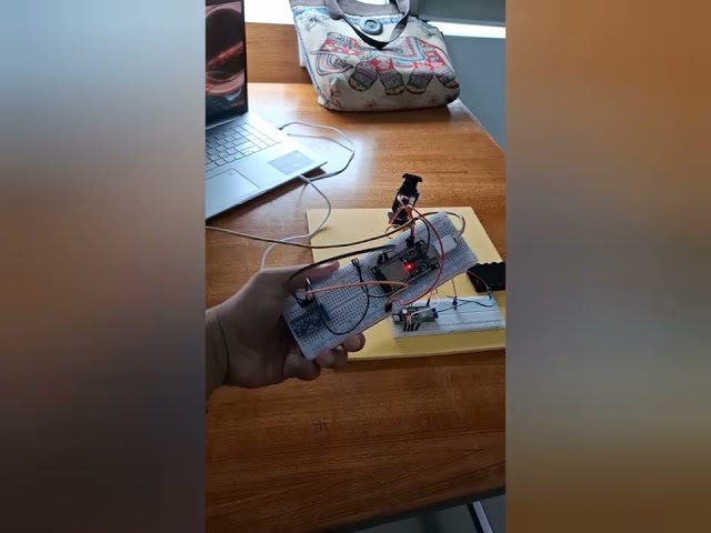 Wirelessly controlling 2-Axis Robotic Arm through motion sense with ESP-32