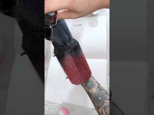 Rose gold and black glitter tumbler on a Stanley #glittertumblers