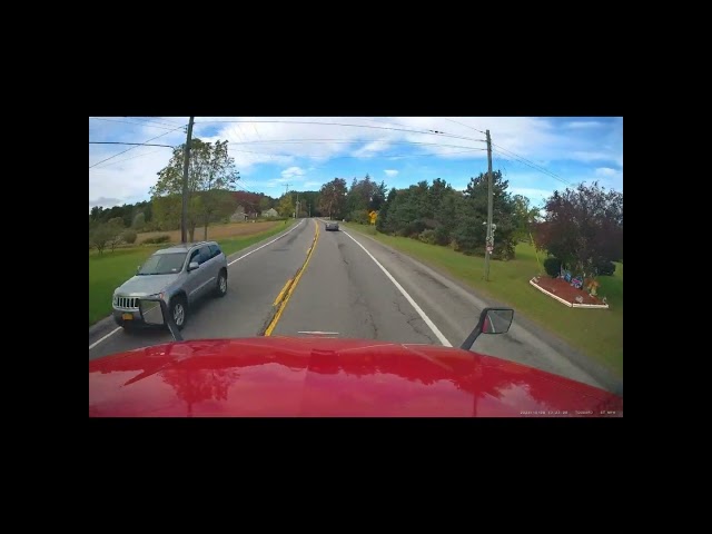 Idiot driver cuts up my semi crossing solid yellow.