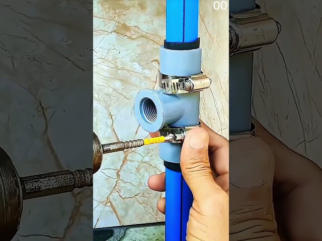 adjusting a blue pipe connection on a brass water valve #plumbing #repair