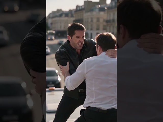 Men Fighting at the Top of the Bus