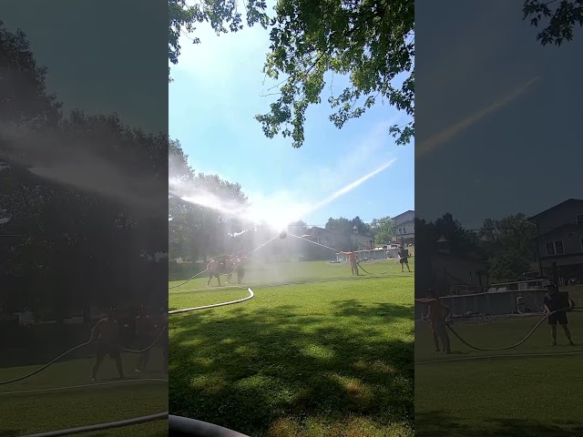 a backyard water battle on a hot day # shorts