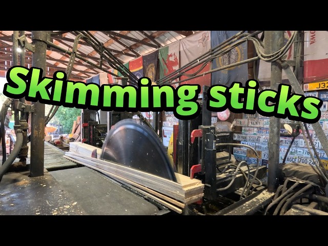 Sawing spruce skimming sticks # 929
