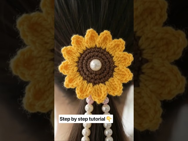 unbelievable, this sunflower is made of wool. #crochet #shorts #shortsfeed #crochetflower #hairstyle