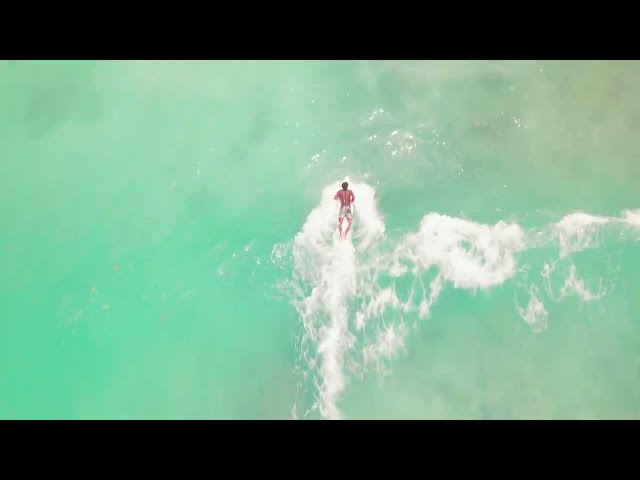 Surfing at Boston Bay Beach, Portland, Jamaica