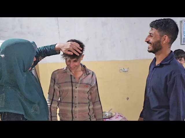 Buying clothes for Hussein, making him and his mother happy to go to school