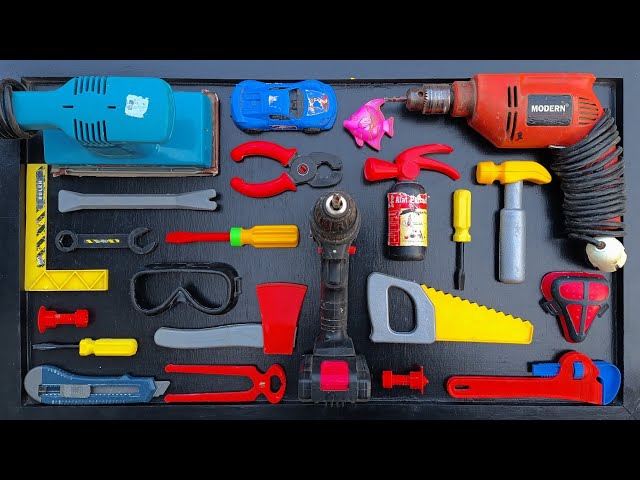 Collection of Repair Tools, Electric Drill, Electric Saw, Hammer With Wriench, Pliers, Hacksaw