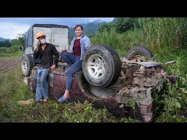 The girl rescued the overturned car, repaired and rebuilt the car's engine.