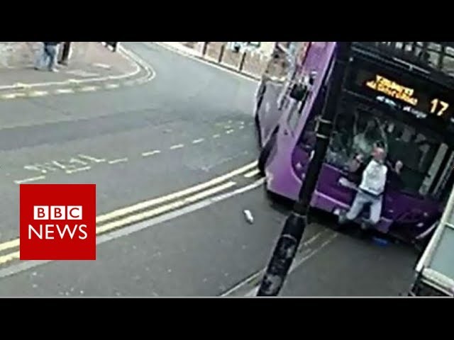 CCTV footage shows man hit by bus in Reading - BBC News